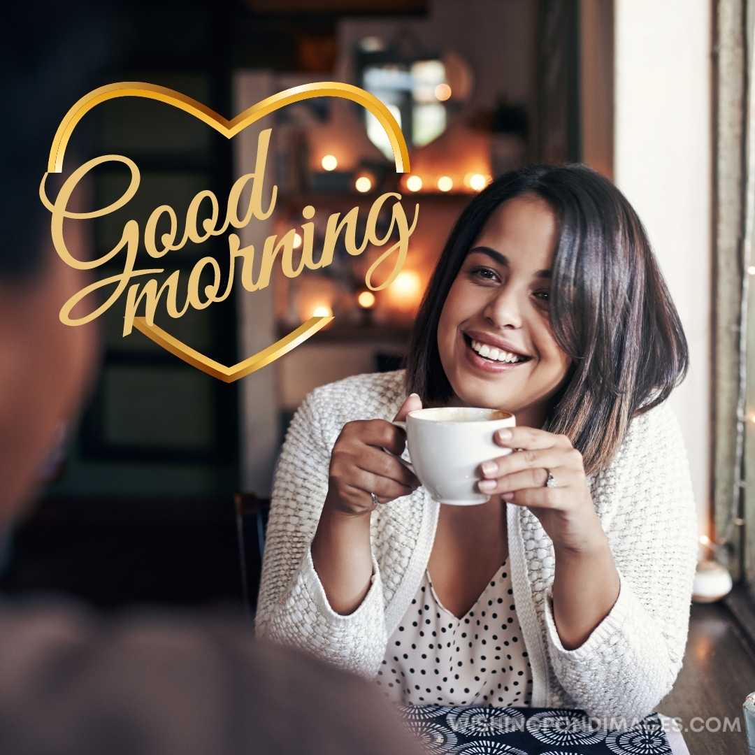 Shot of a woman enjoying a cup of coffee with a friend at a cafe. Good Morning Coffee Images